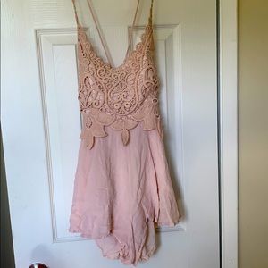 A.Peach Light pink romper size small